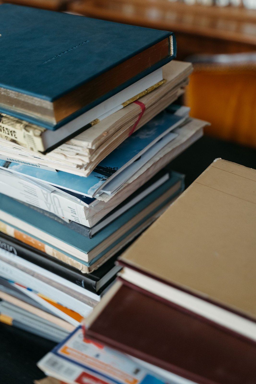 Stack of books with different bindings and sizes