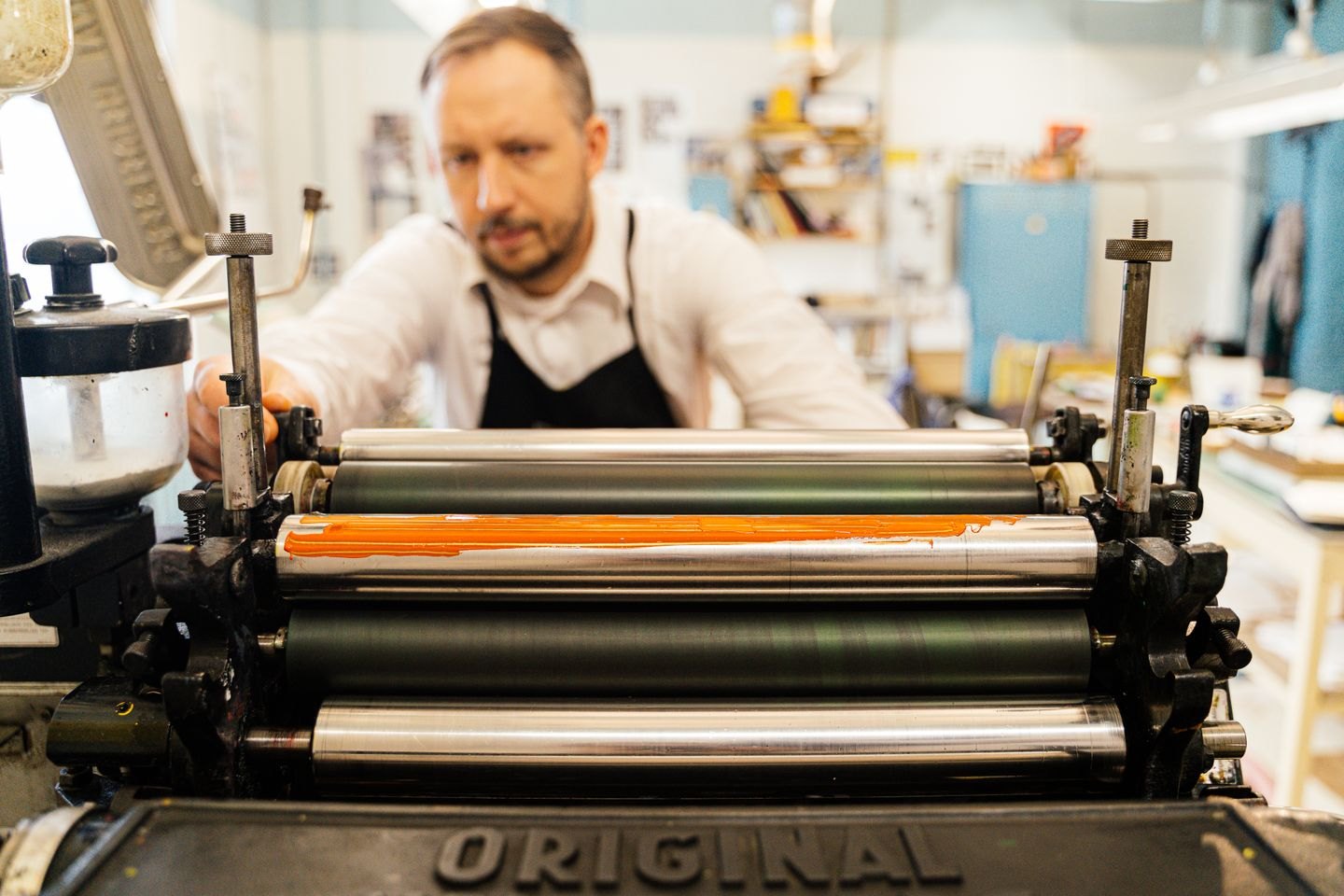 Operator working at a printing press