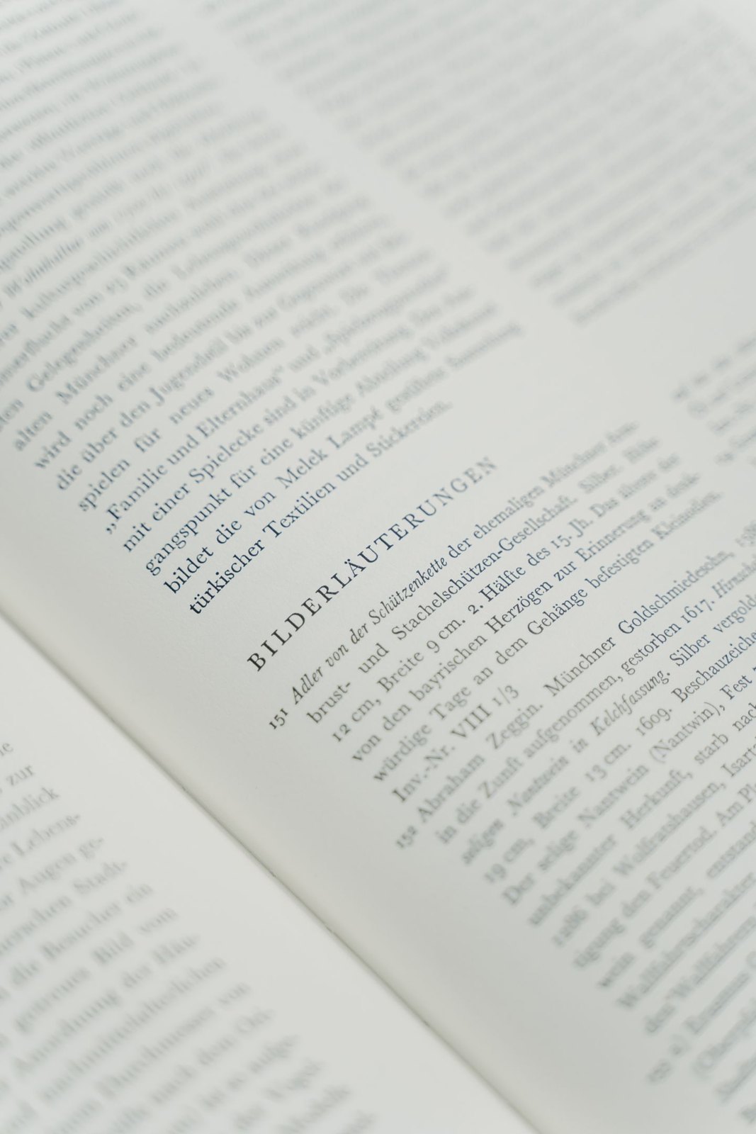 Open book showing lines of body text and the centre gutter