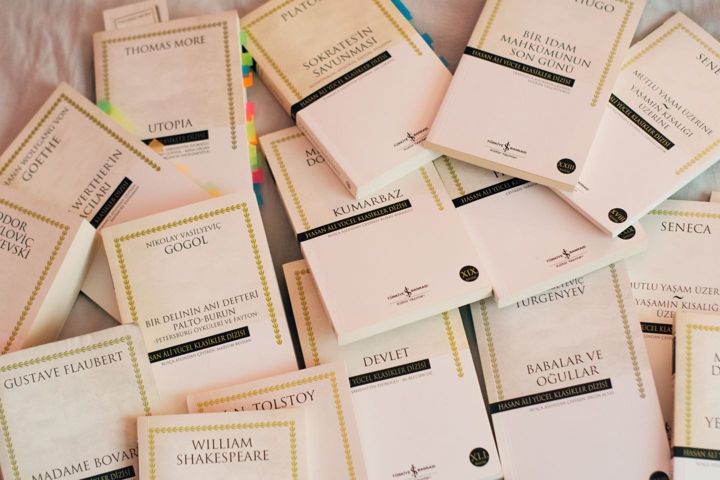 Coordinated cream classic-book covers displayed together